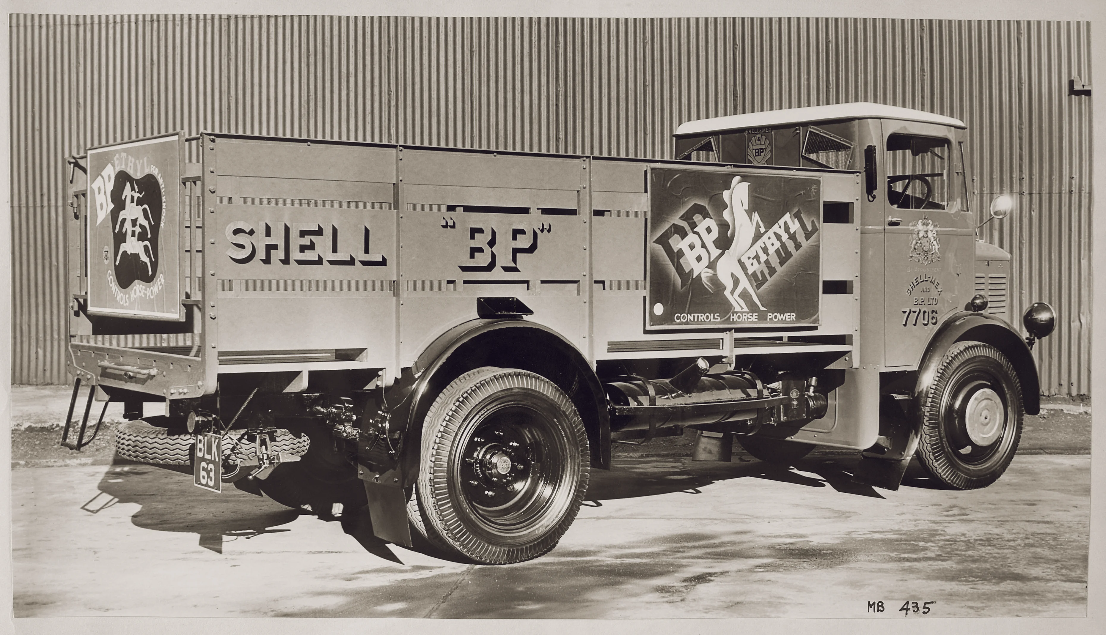 A delivery truck displaying BP Ethyl posters, c.1930s 