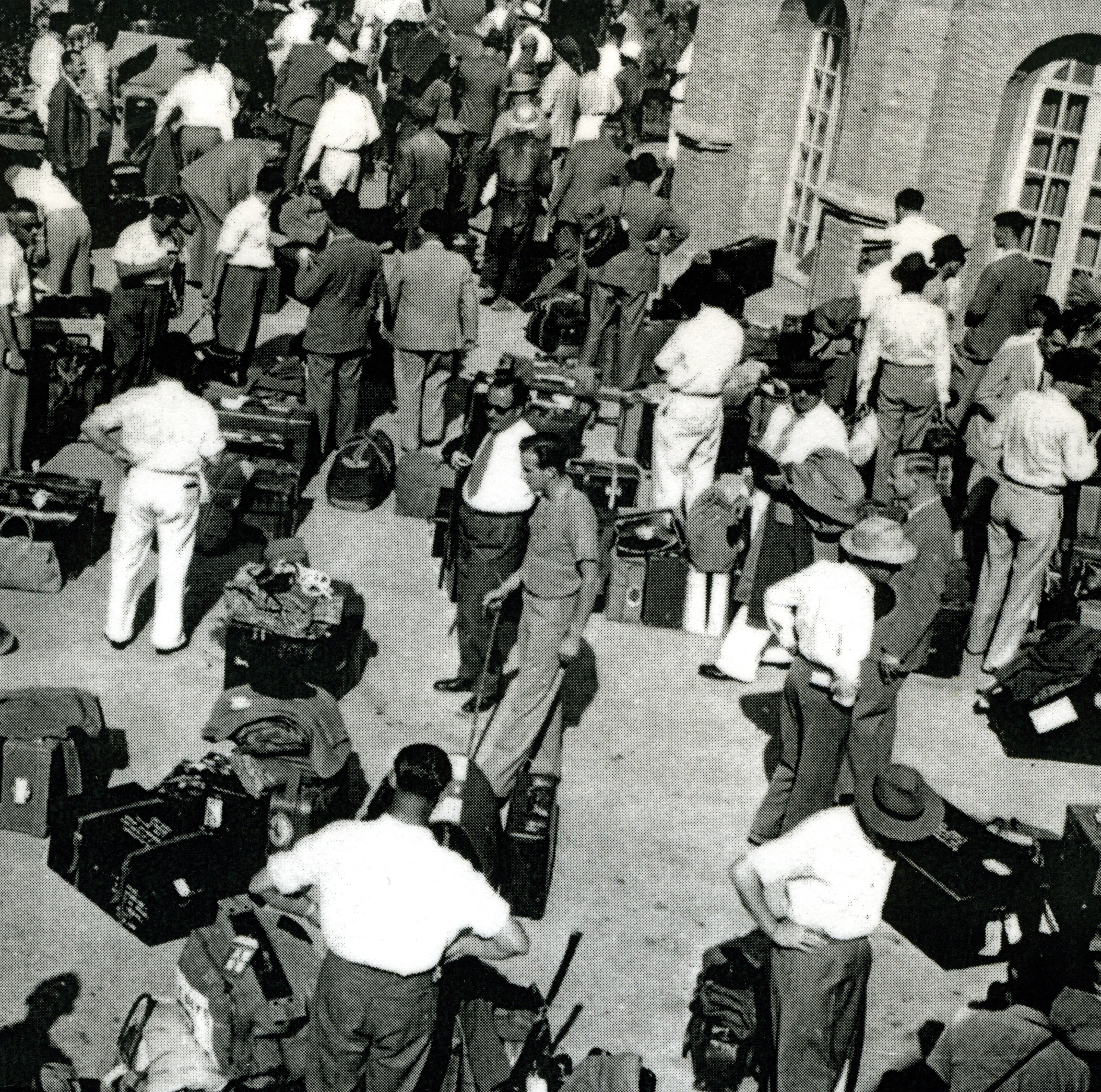 Company staff gathering at the Gymkhana Club, Abadan, before boarding HMS Mauritius, October 1951 