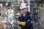 A bp team member wearing protective gear works at Cherry Point refinery