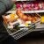 A shopping basket filled with a variety of food