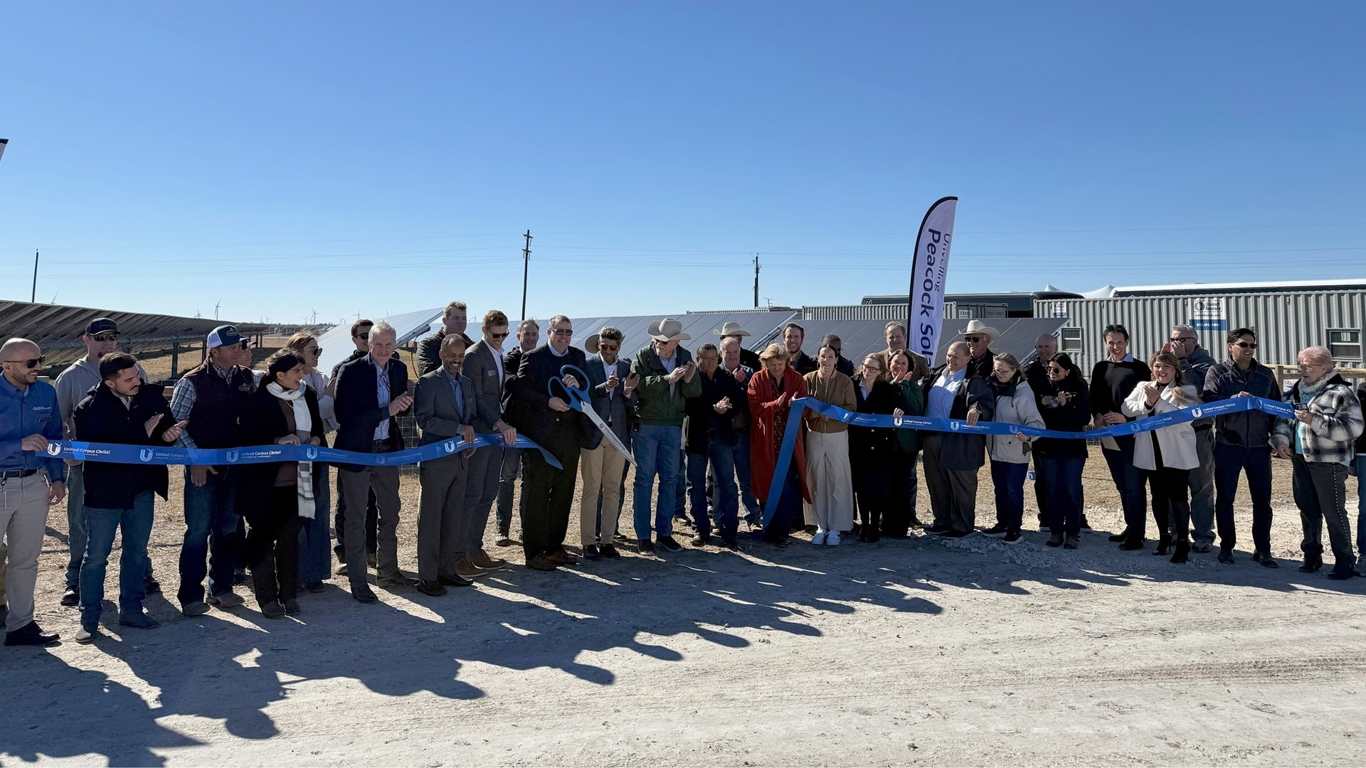 A ribbon cutting at Peacock solar farm